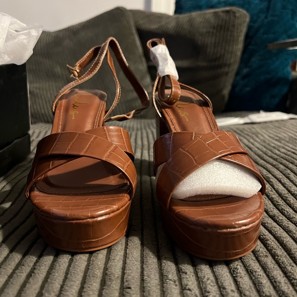 Never worn Lulus heeled sandals. Size 7.